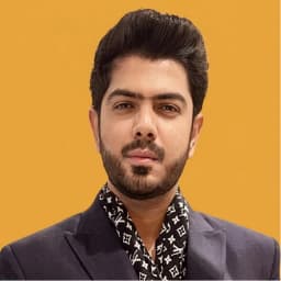 Portrait of Omair Saddiq, Senior Cover Designer at HMD Publishing